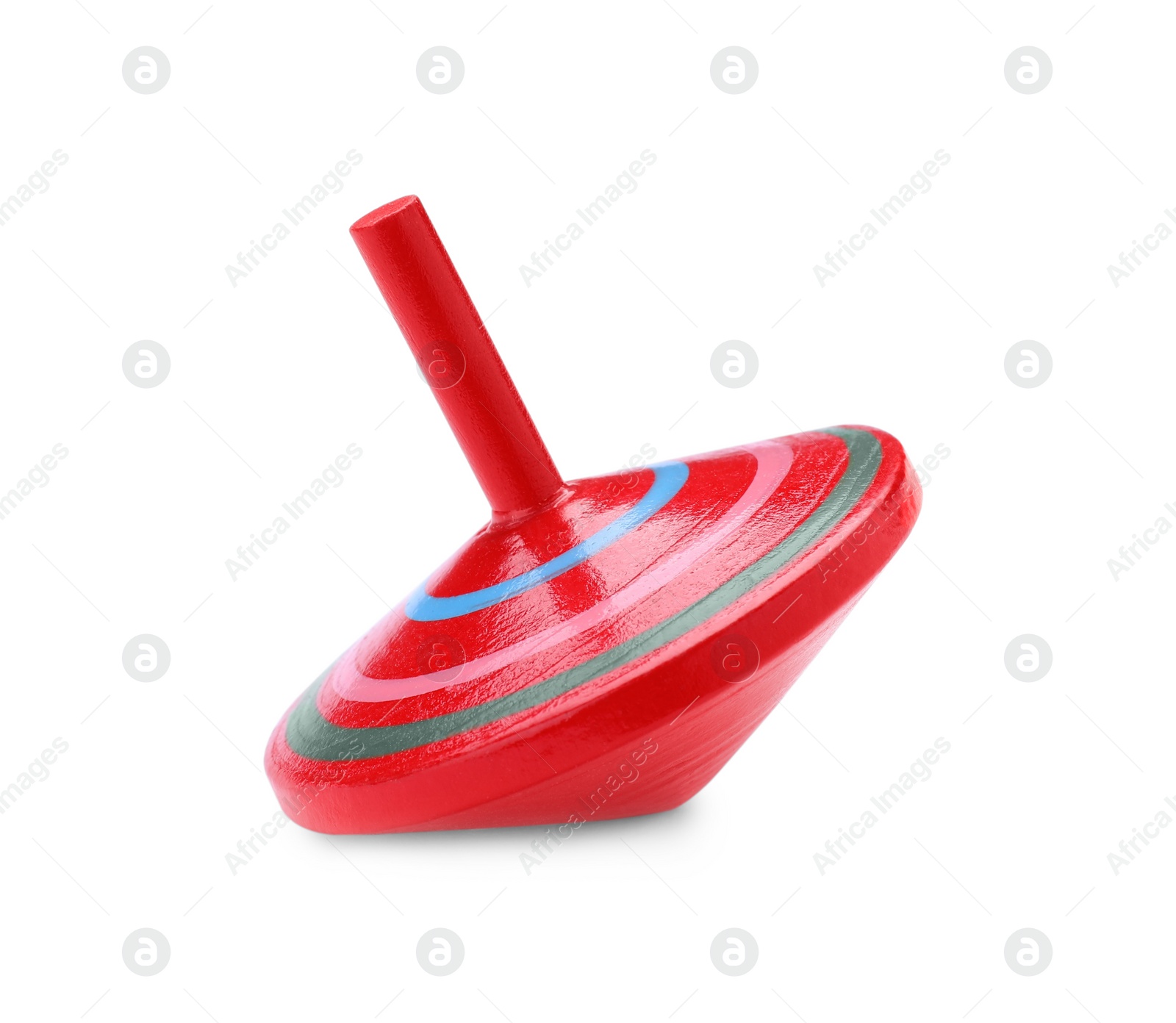 Photo of One bright spinning top isolated on white. Toy whirligig