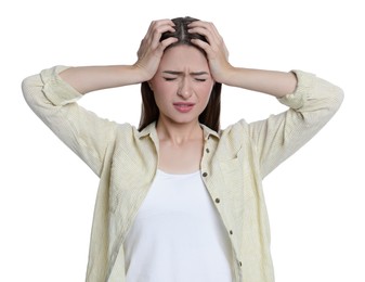 Young woman suffering from headache on white background