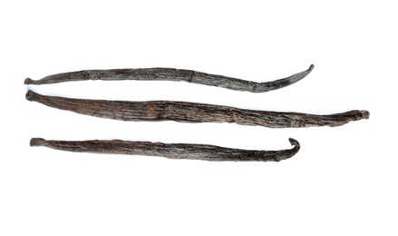 Photo of Dried aromatic vanilla sticks on white background, top view