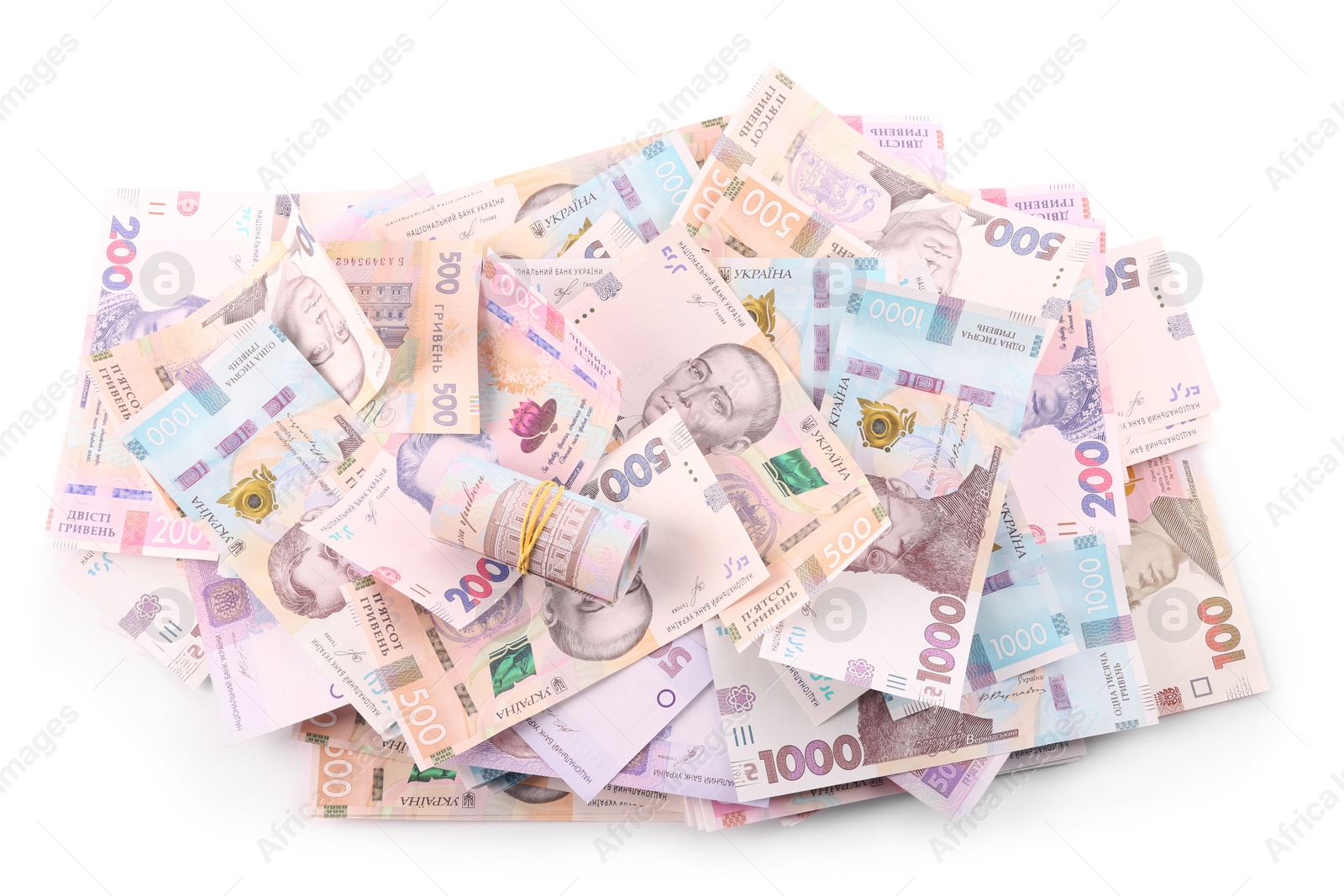 Photo of Ukrainian money on white background, top view