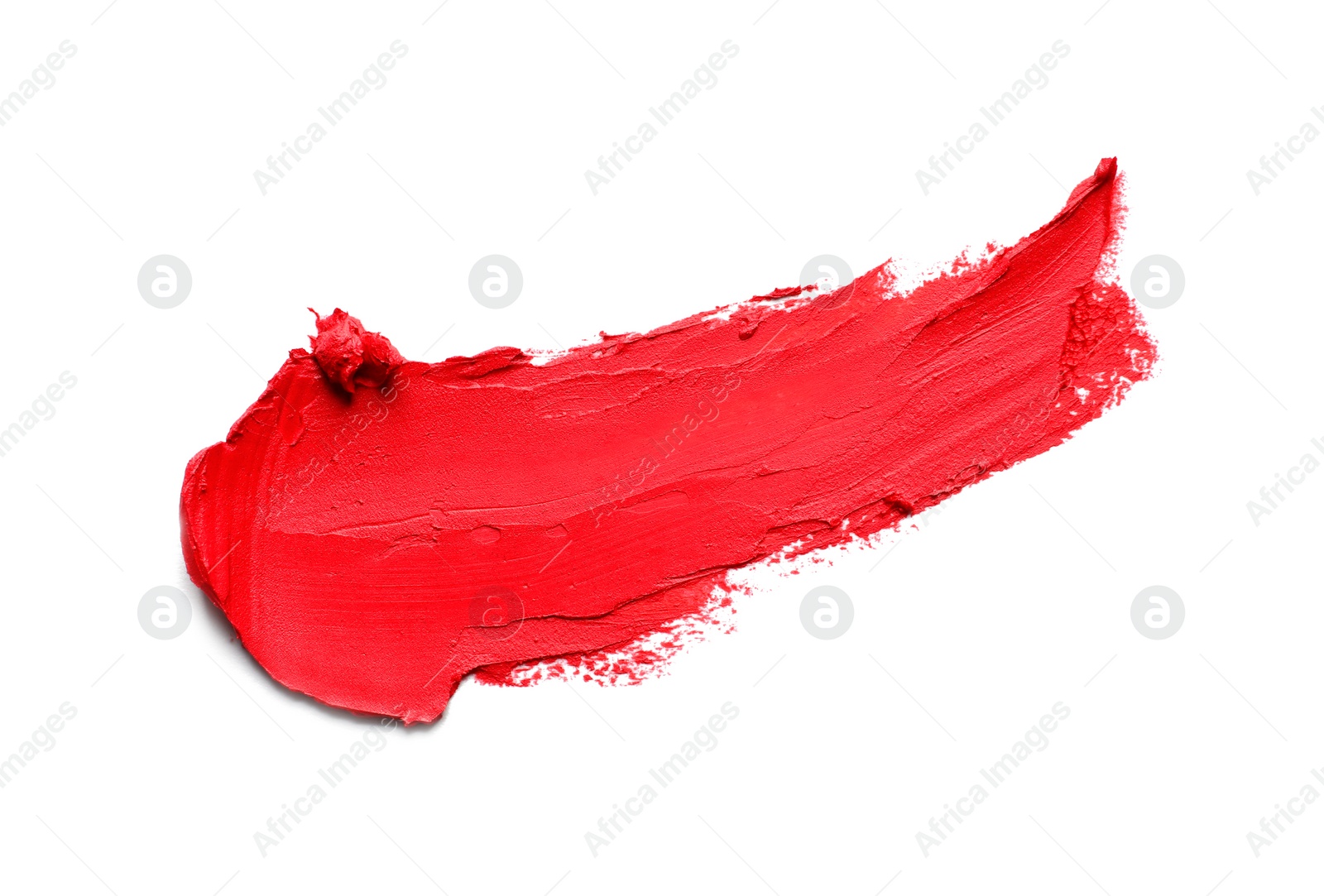 Photo of Stroke of lipstick on white background, top view