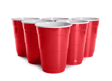 Many red plastic cups on white background. Beer pong game