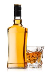 Photo of Glass and bottle of whiskey isolated on white