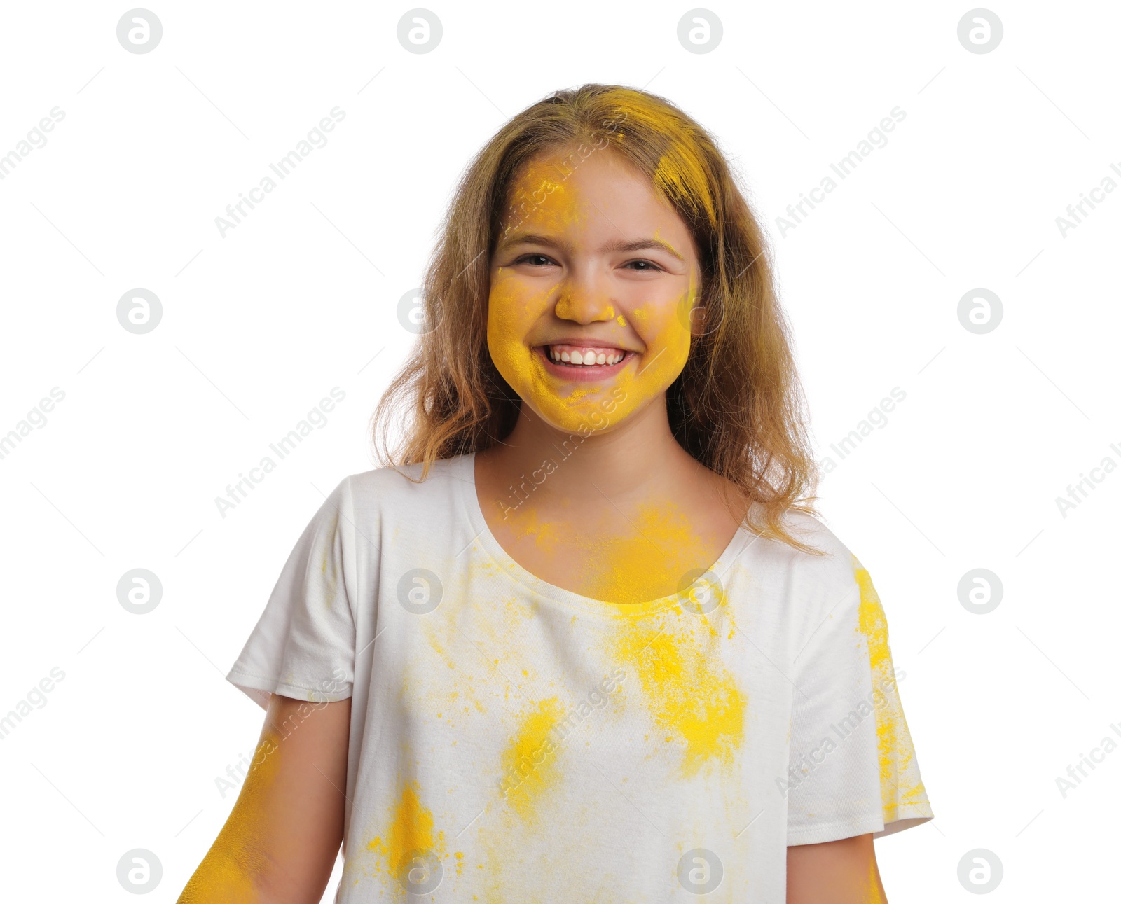 Photo of Teen girl covered with yellow powder dye on white background. Holi festival celebration