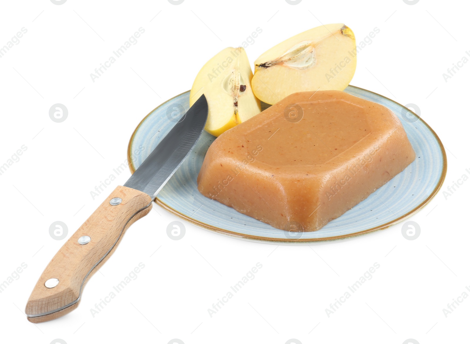 Photo of Delicious sweet quince paste, knife and fresh cut fruit isolated on white