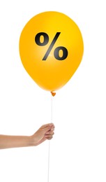 Image of Discount offer. Woman holding yellow balloon with percent sign on white background, closeup