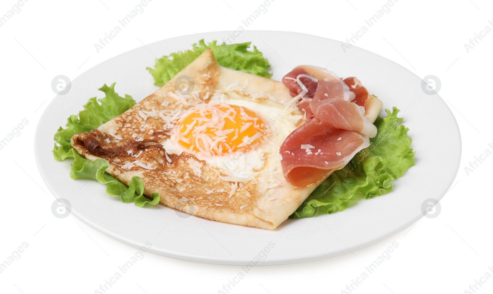 Photo of Delicious crepe with egg isolated on white. Breton galette