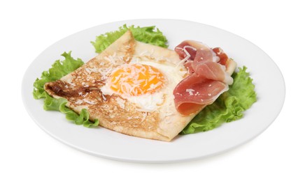 Photo of Delicious crepe with egg isolated on white. Breton galette