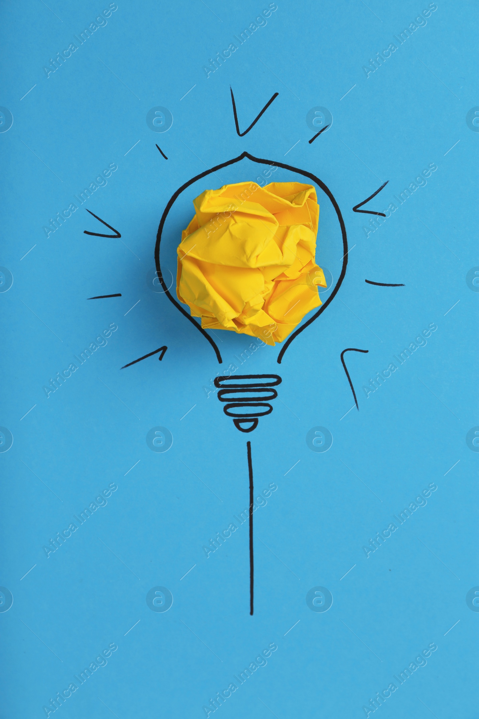 Photo of Composition with crumpled paper ball and drawing of lamp bulb on color background, top view. Creative concept