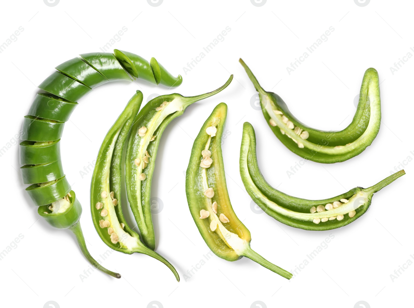 Image of Set with cut green chili peppers on white background, top view 