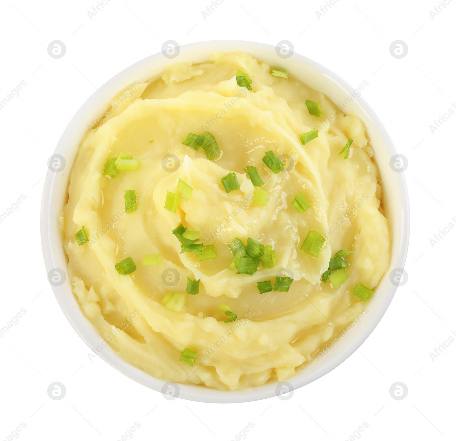 Photo of Bowl of tasty mashed potato with green onion isolated on white, top view