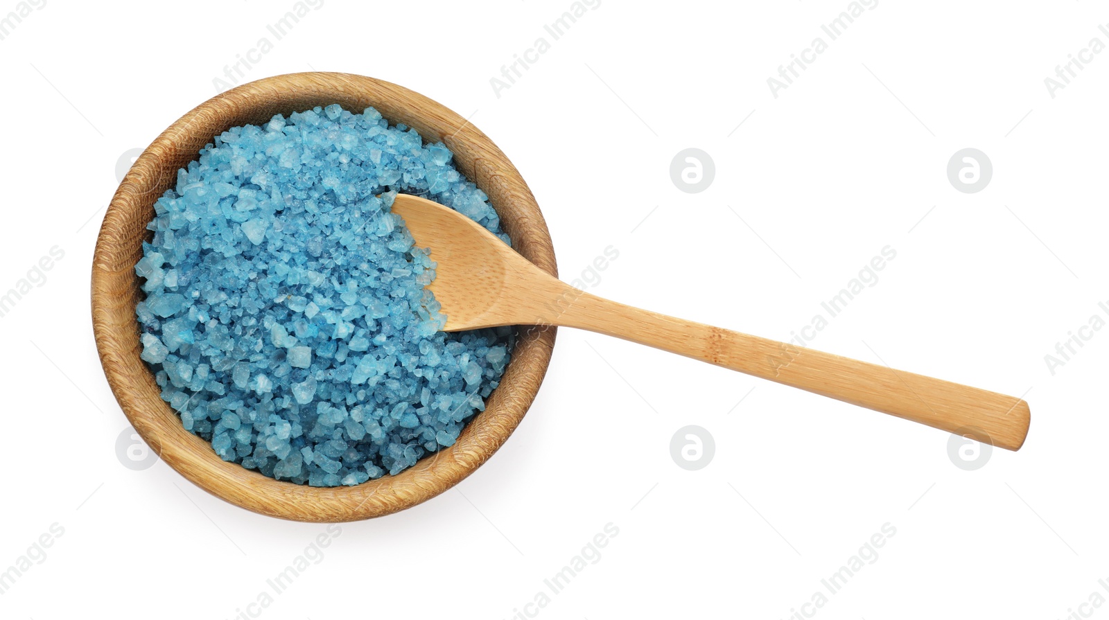 Photo of Bowl with blue sea salt and spoon isolated on white, top view