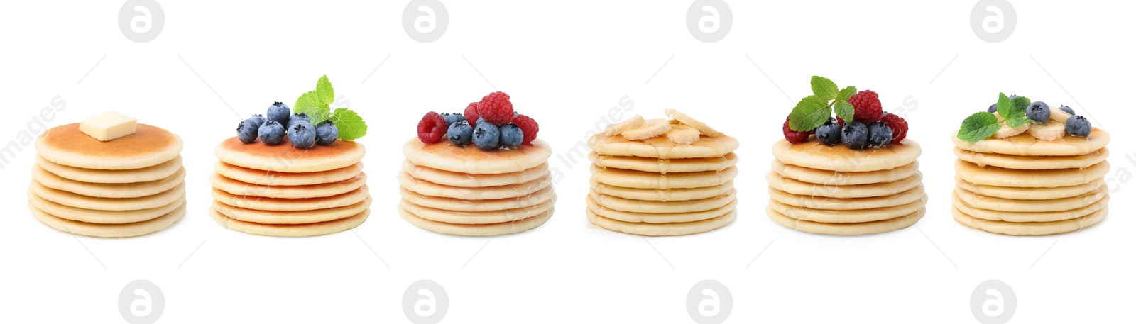 Image of Set of tasty pancakes with toppings isolated on white