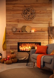 Photo of Cozy living room interior inspired by autumn colors