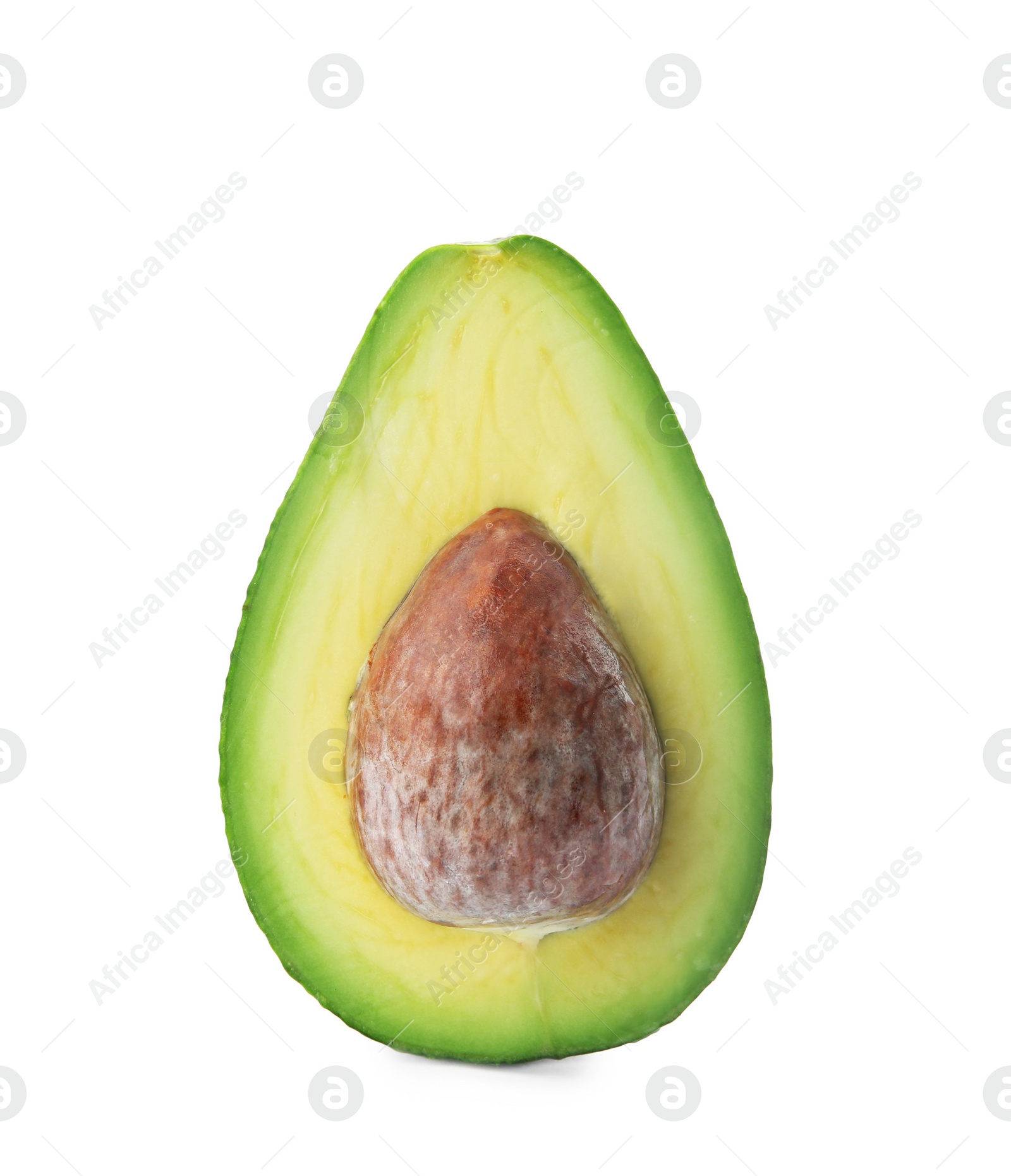 Photo of Half of ripe avocado with pit on white background