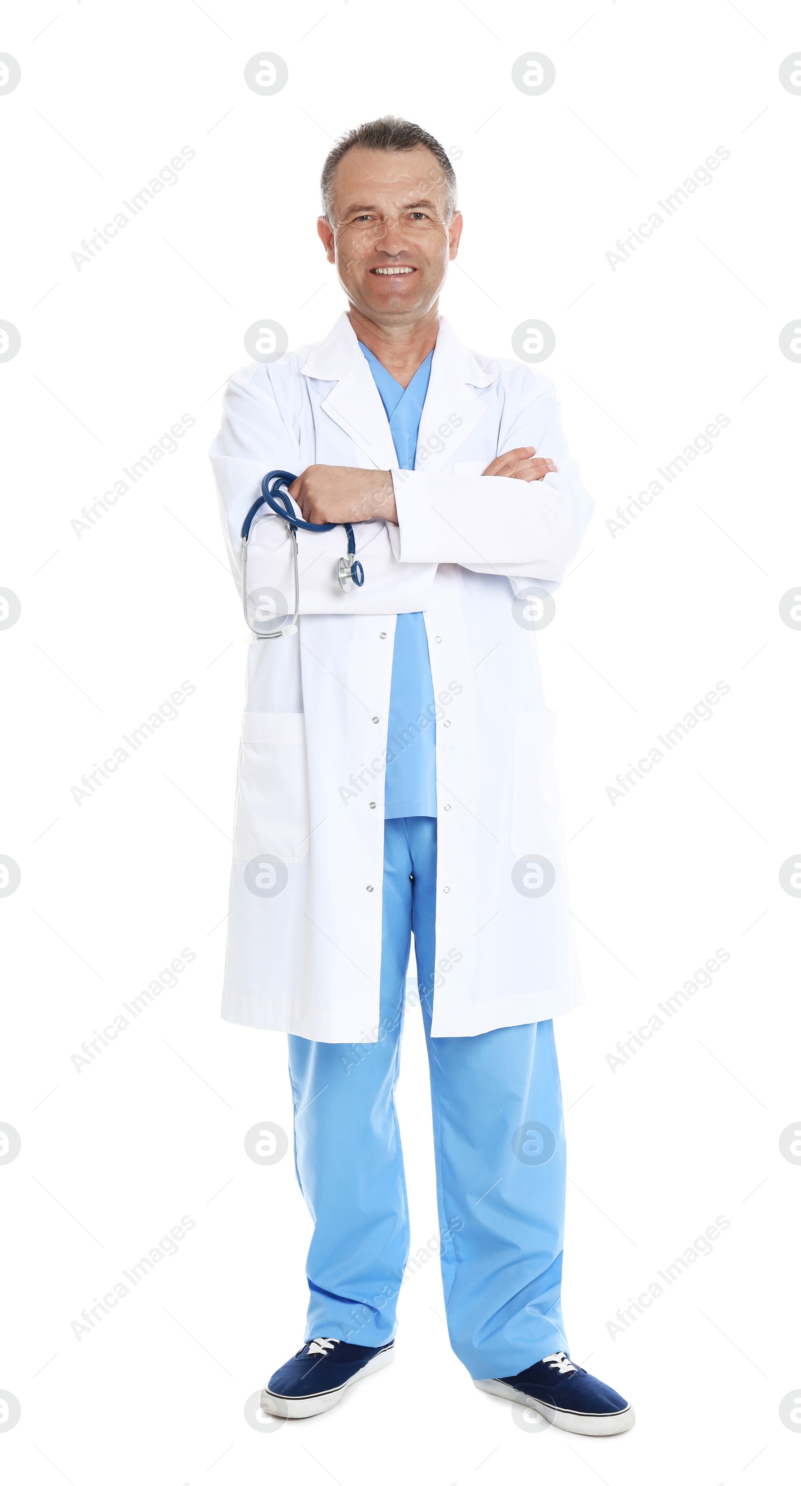 Photo of Full length portrait of experienced doctor in uniform on white background. Medical service