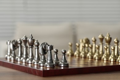 Photo of Set of chess pieces on checkerboard before game, selective focus. Space for text
