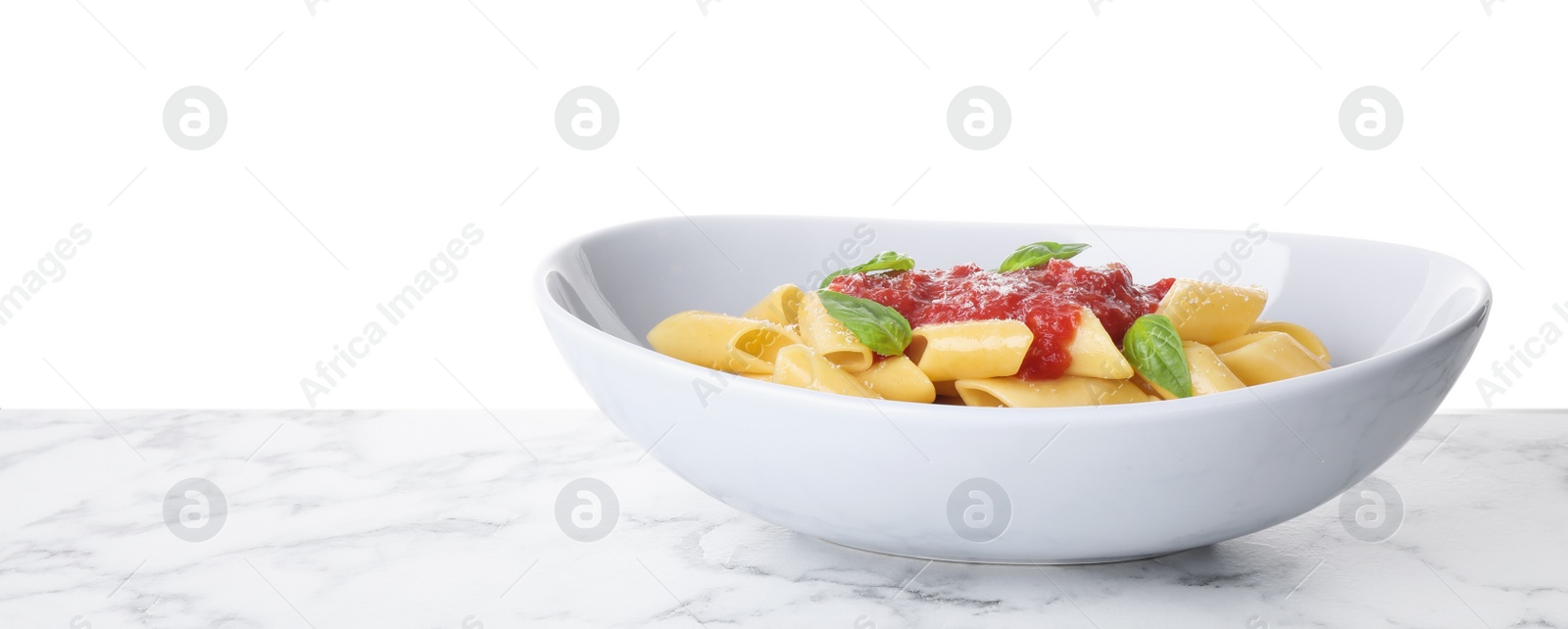 Photo of Tasty pasta with tomato sauce, basil and cheese on marble table against white background. Space for text