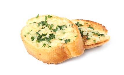 Photo of Slices of tasty garlic bread with herbs isolated on white