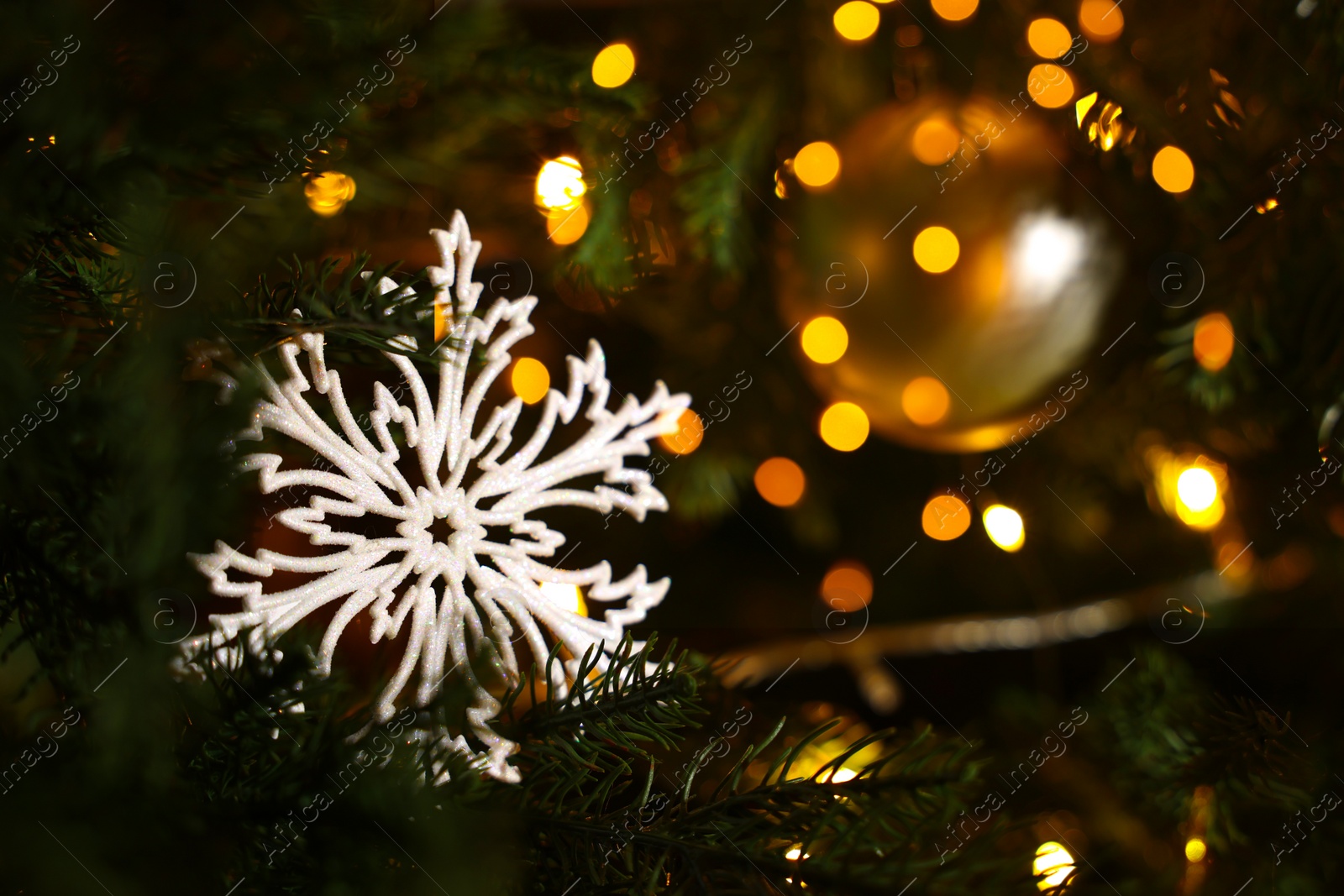 Photo of Closeup view of Christmas tree with beautiful decor