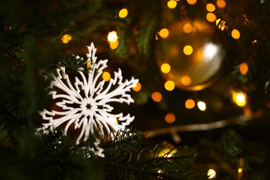 Photo of Closeup view of Christmas tree with beautiful decor