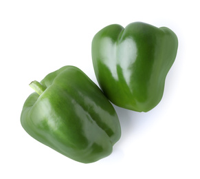 Photo of Ripe green bell peppers isolated on white, top view