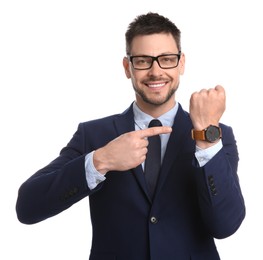 Photo of Happy businessman pointing on wristwatch against white background. Time management