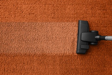 Image of Vacuuming carpet. Clean area after using device, top view