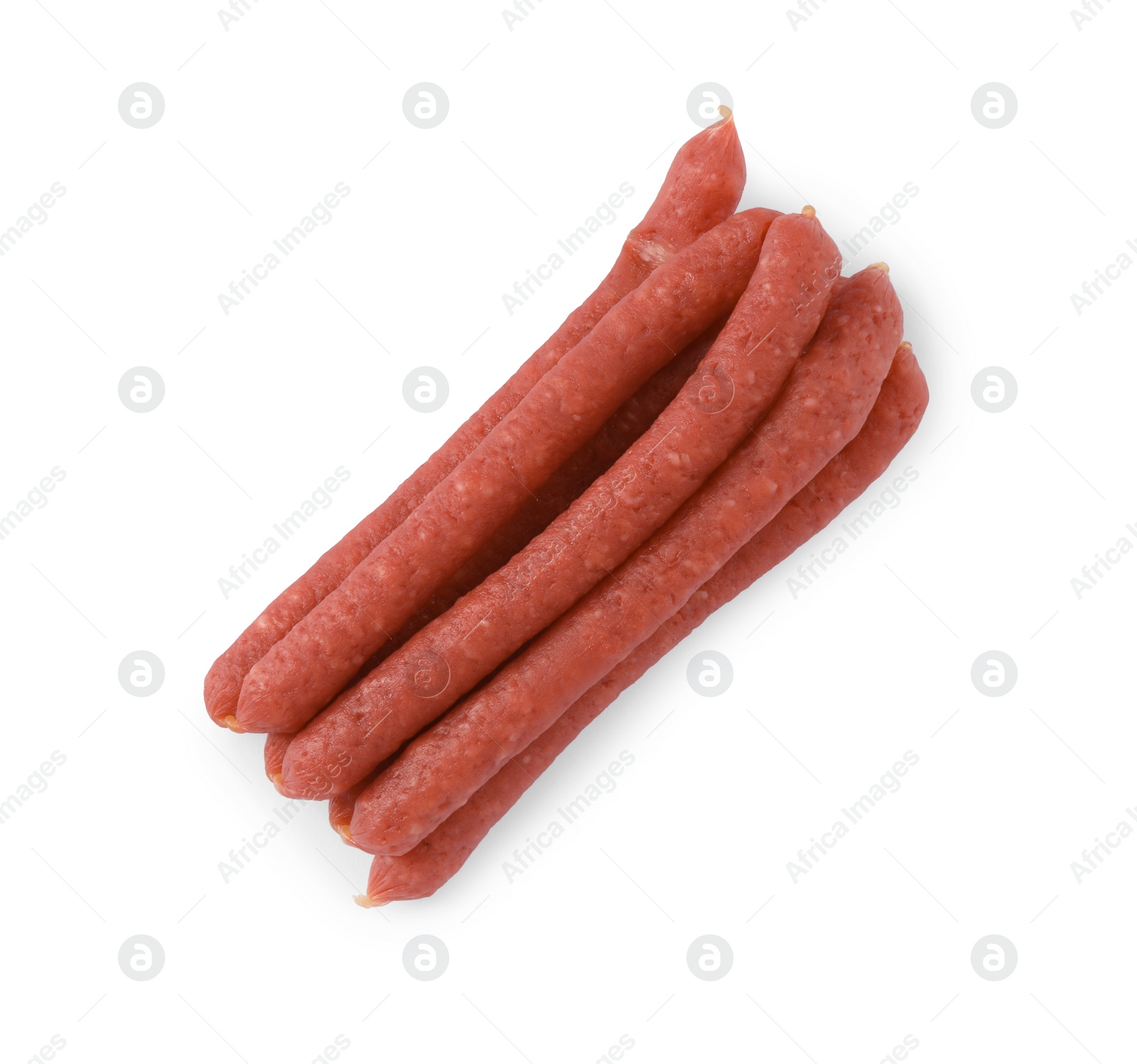 Photo of Thin dry smoked sausages isolated on white, top view