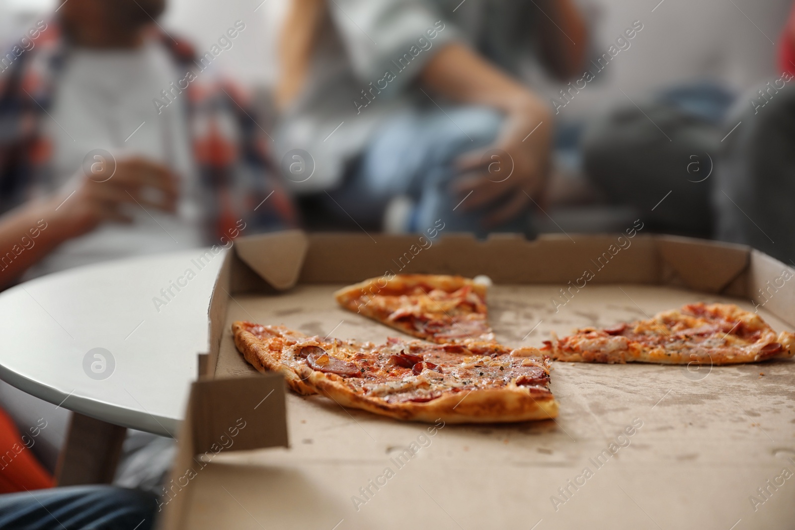 Photo of Tasty fresh pizza on table indoors, closeup