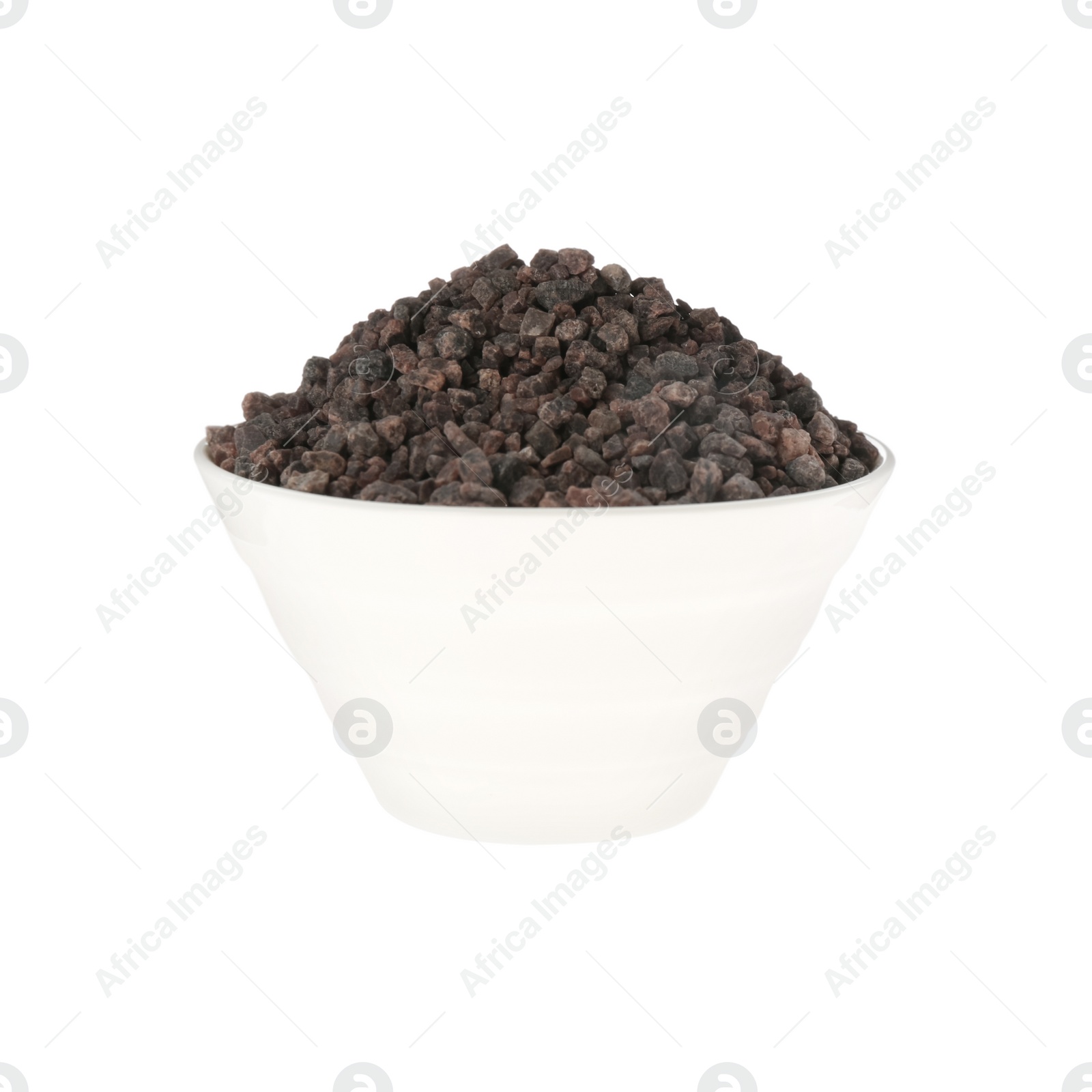 Photo of Black salt in ceramic bowl isolated on white