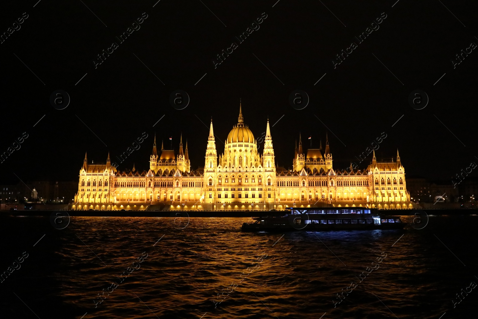 Photo of BUDAPEST, HUNGARY - APRIL 27, 2019: Beautiful night cityscape with illuminated Parliament Building