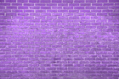 Image of Texture of dark violet brick wall as background