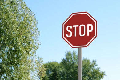 Photo of Road sign Stop on city street. Space for text