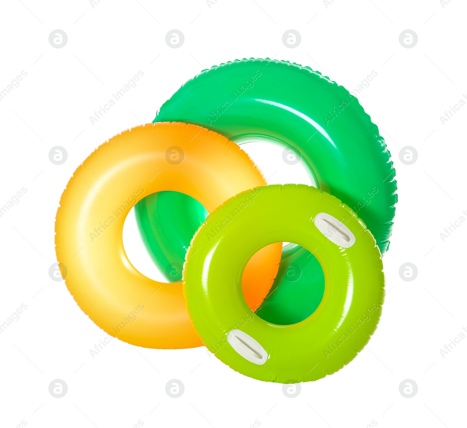 Photo of Different inflatable rings on white background. Summer holidays