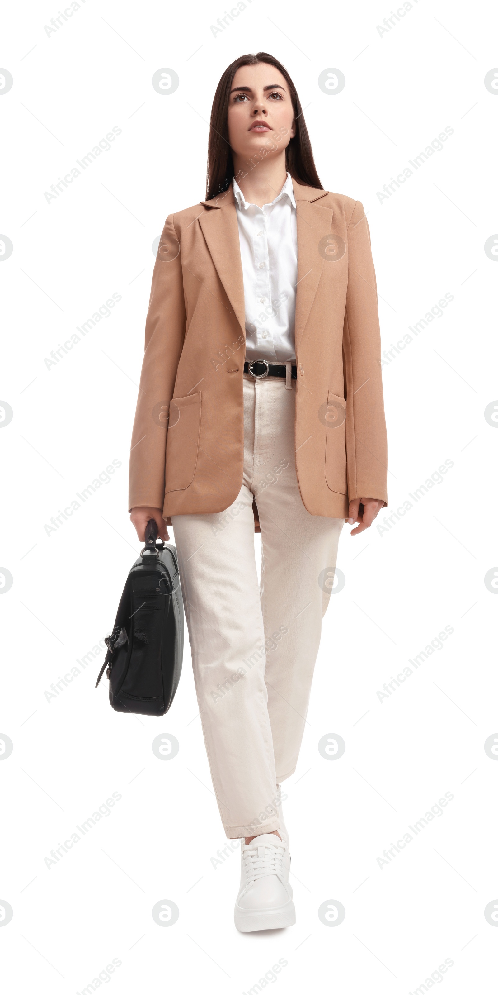 Photo of Beautiful businesswoman with briefcase walking on white background