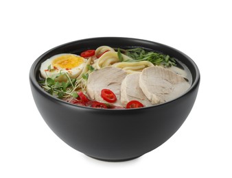 Delicious ramen with meat and egg in bowl isolated on white. Noodle soup