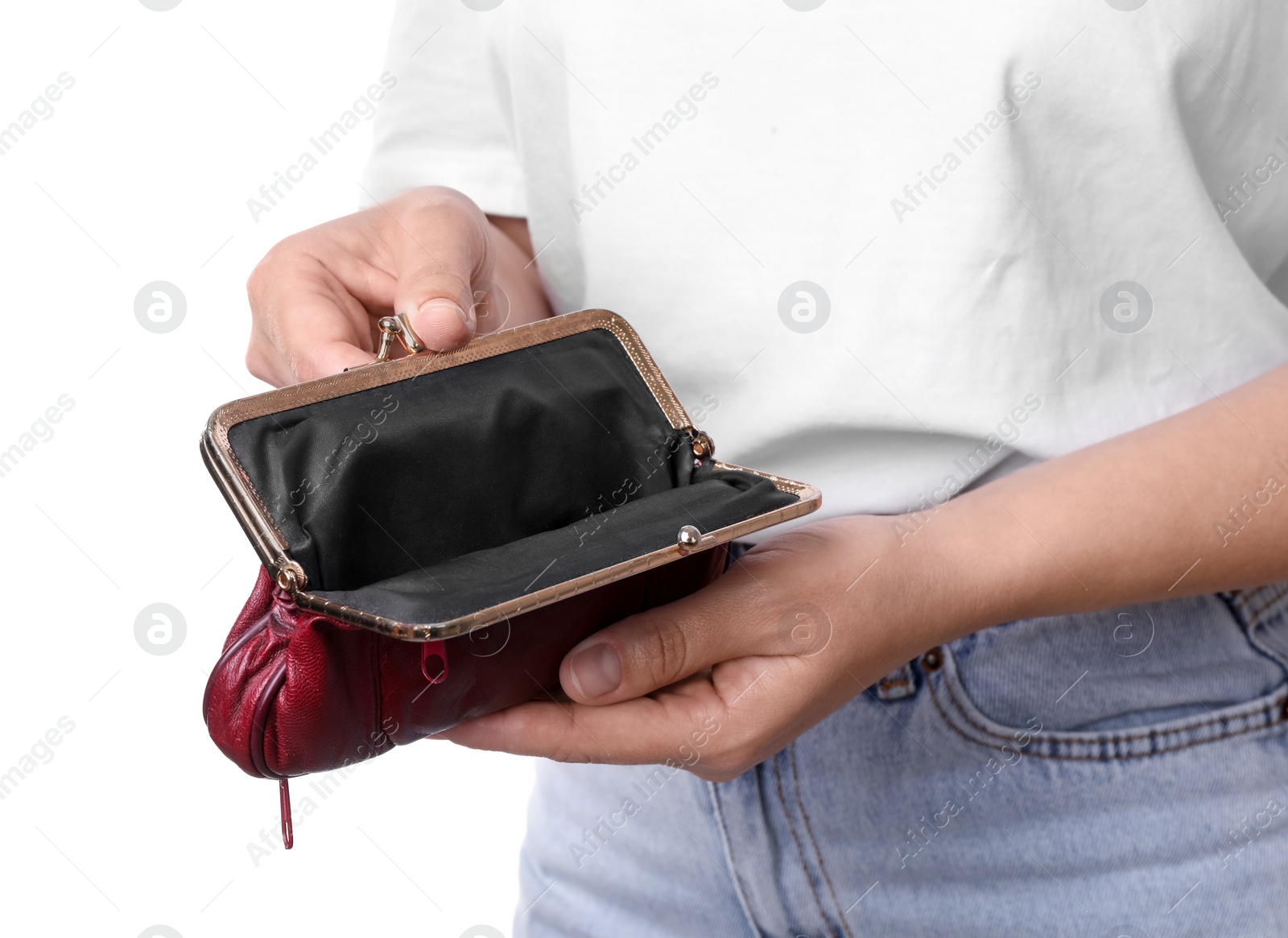 Photo of Poor woman with empty wallet on white background, closeup