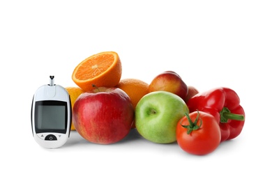 Photo of Digital glucometer and healthy food on white background. Diabetes diet