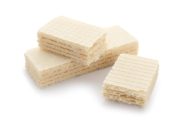 Photo of Delicious crispy wafers on white background. Sweet food