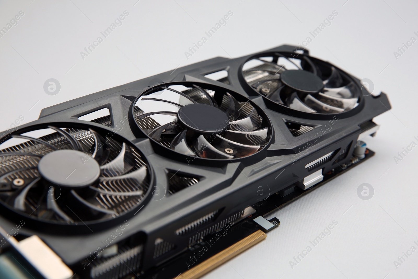 Photo of One graphics card on color background, closeup