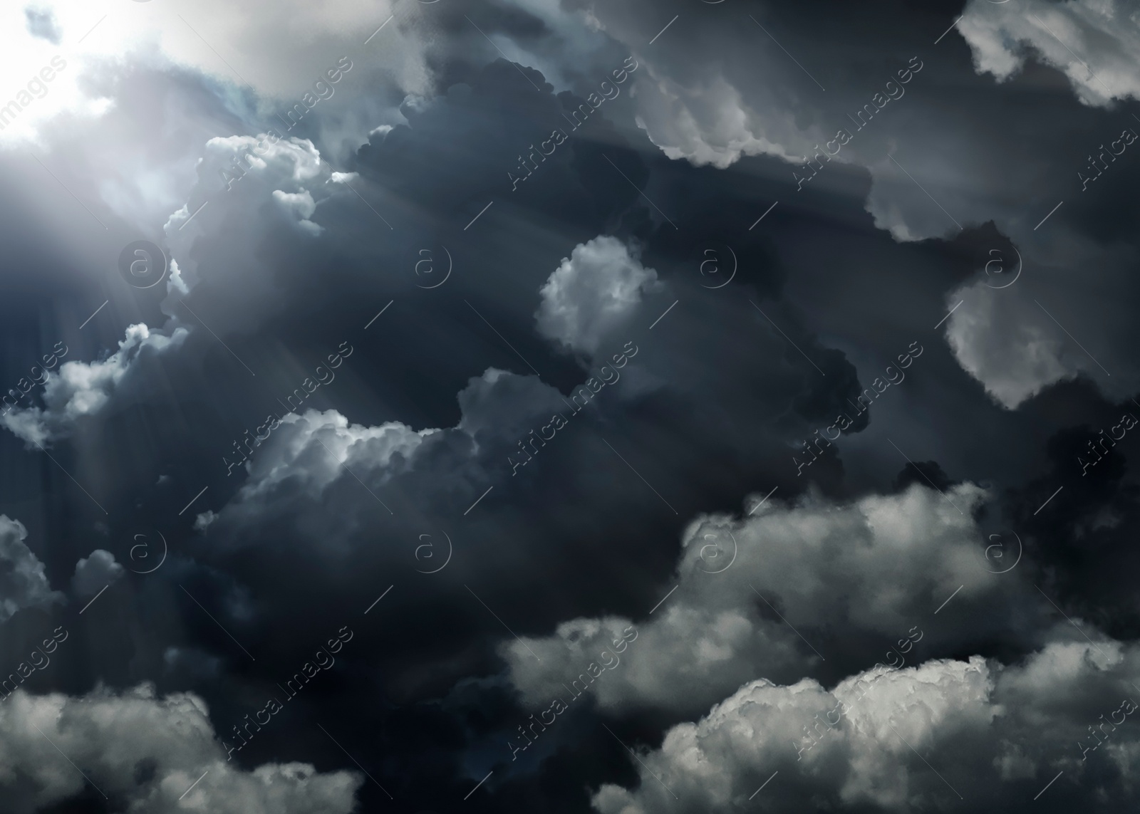 Image of Beautiful view of sky covered with grey thunderclouds