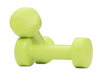 Photo of Light green dumbbells isolated on white. Sports equipment