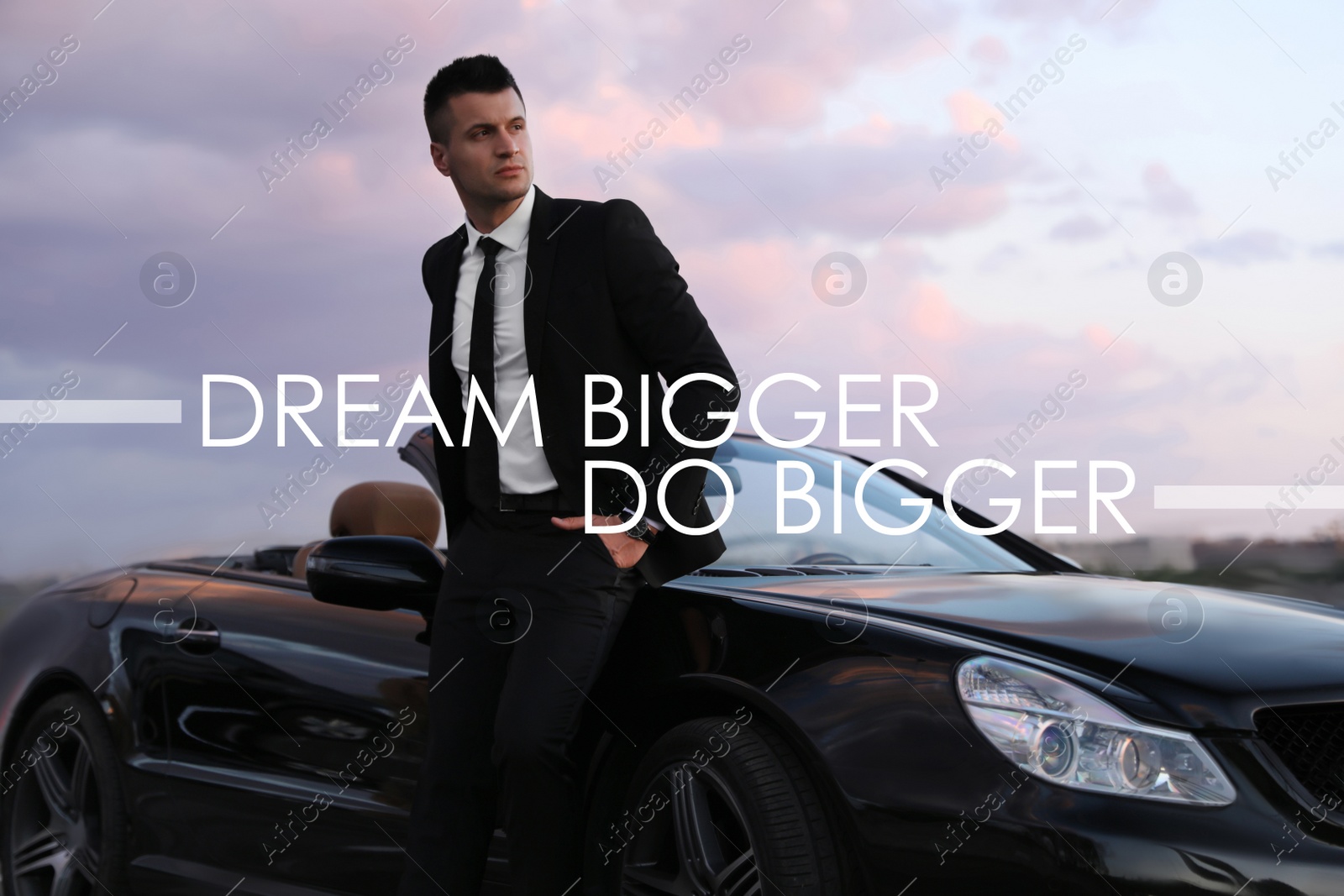 Image of Dream Bigger Do Bigger. Inspirational quote motivating to set life goals freely and forget about reasons that can hold back. Text against successful businessman with luxury car