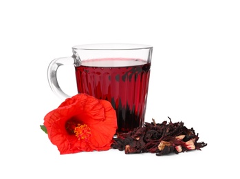 Photo of Delicious hibiscus tea and dry flowers on white background