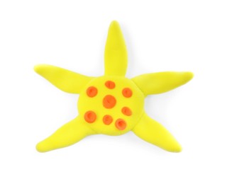 Photo of Colorful starfish made from play dough isolated on white, top view