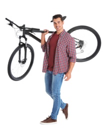 Handsome young man with modern bicycle on white background