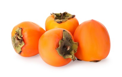 Delicious ripe juicy persimmons on white background