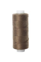 Photo of Spool of brown sewing thread isolated on white