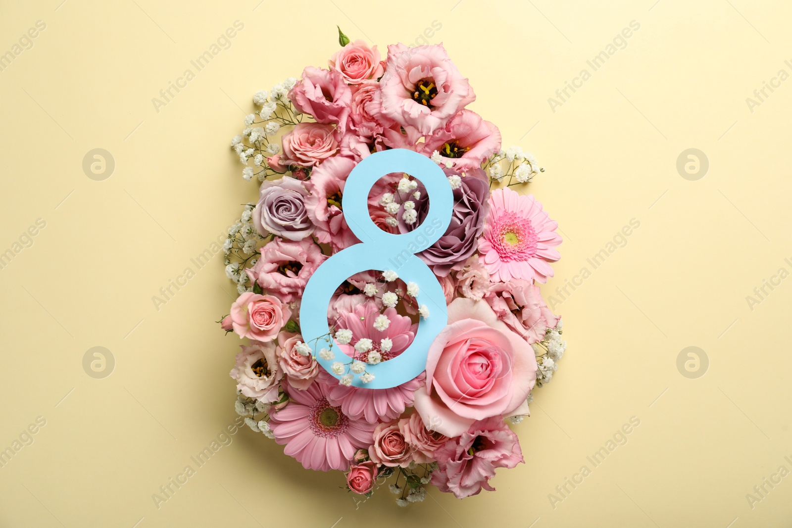 Photo of 8 March greeting card design with beautiful flowers on beige background, flat lay. International Women's day